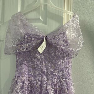 Beautiful long dress . Very pretty Never worn .